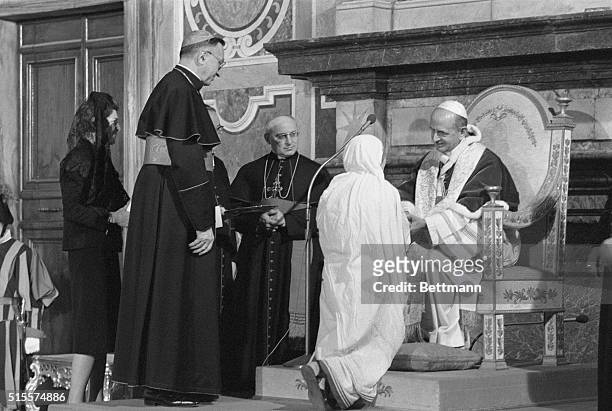 Pope Paul VI awards the first Pope John XXIII Peace Prize to Mother Teresa for her work among the poor in Calcutta and her founding of an order...