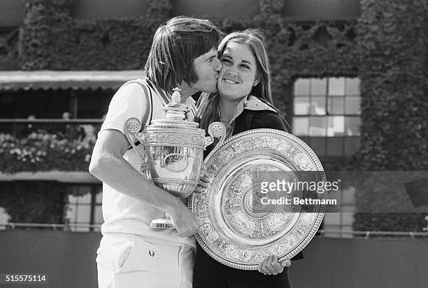 Wimbledon: The Wimbledon champions-Jimmy Connors kisses his fiance Chris Evert, after they had won the Men's Singles and Women's Singles titles. They...
