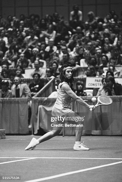 Detroit:Rosie Casals, of Saulsalito, CA, returns a backhand serve to Chris Evert, of Fort Lauderdale, FL, during their match 2/22 at the Virginia...