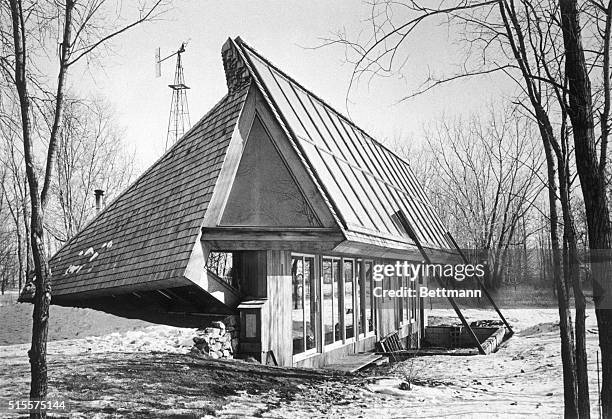 Solar panels collect energy from the sun atop the roof of a house designed by 150 University of Minnesota architecture students. Another source of...