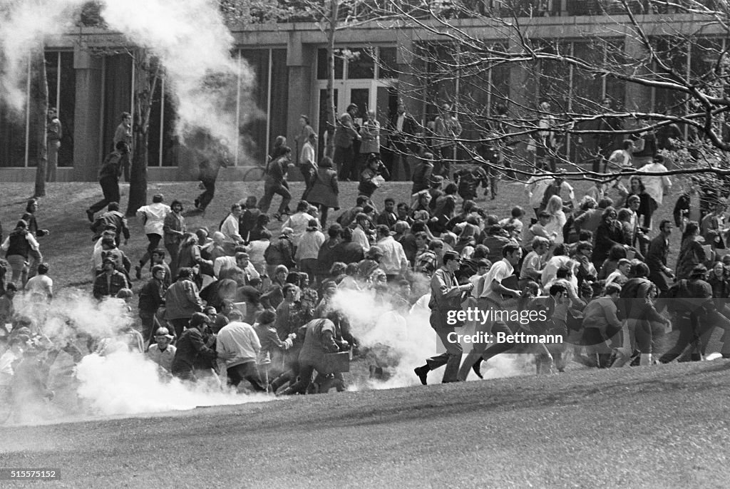 Demonstrators Flee Tear Gas