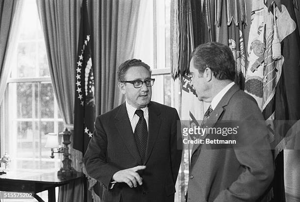 Washington-President Nixon and Henry A. Kissinger pose for cameras in the oval office after Secy. Of State Kissinger won the Nobel Peace Prize for...
