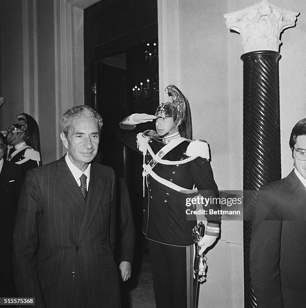 Italian Foreign Minister Aldo Moro leaves President Giovanni Leone's office at the Quirinale Palace 10/7 after a meeting in an effort to solve the...