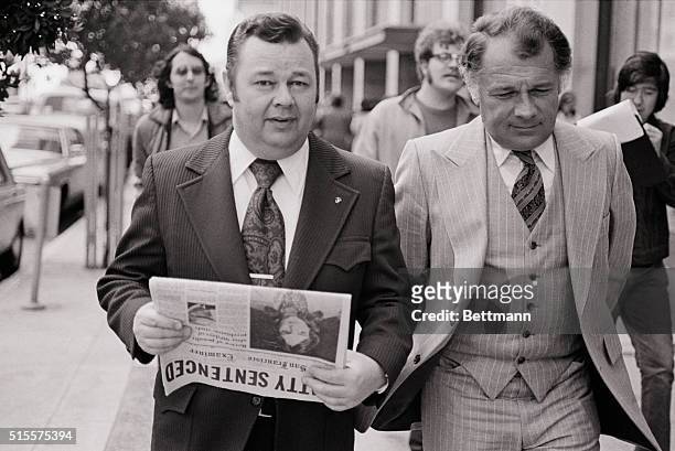 Patricia Hearst's defense attorneys Albert Johnson and F. Lee bailey leave the federal courthouse, after Judge Oliver Carter, at request of the...