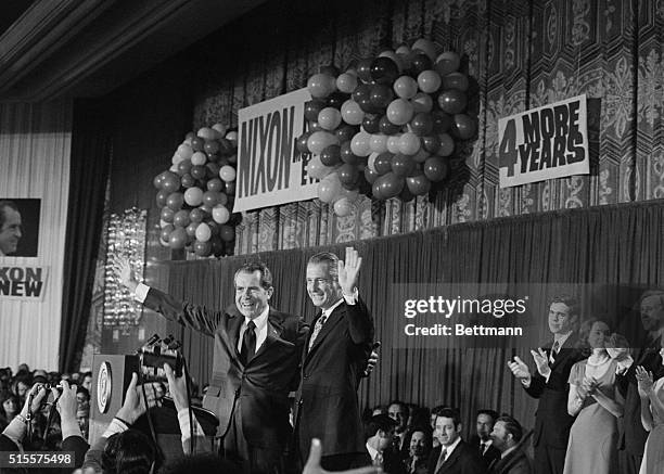 The victorious Republican ticket, President Nixon and Vice President Spiro T. Agnew acknowledge applause as they appear at the Republican election...