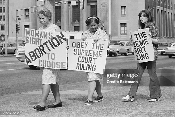 Three generations apart but together on their stand on abortion, Adelle Thomas her daughter, Marie Higgins and her daughter, Catherine Starr join in...