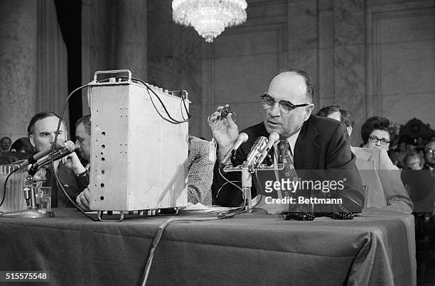 Washington: Watergate conspirator James McCord demonstrates for the Senate Watergate committee May 22 some of the bugging equipment used in the...
