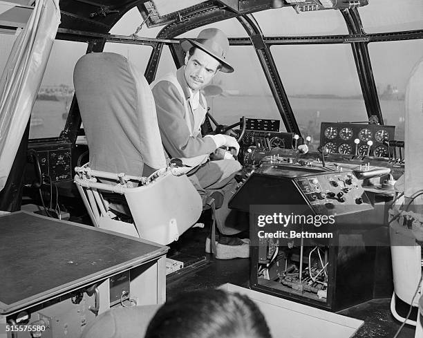 American aircraft designer Howard Hughes prepares for the trial run of his strategic airlift flying boat, the Hughes H-4 Hercules , Los Angeles...