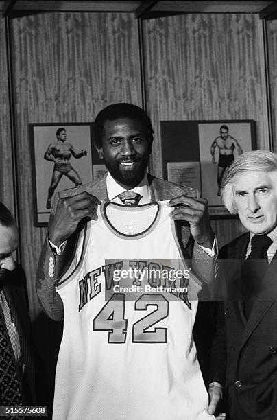 Traded to New York by the Seattle Supersonics, forward Spencer Haywood tries on a Knick uniform Oct. 24. Unable to land Wilt Chamberlain, the Knicks...