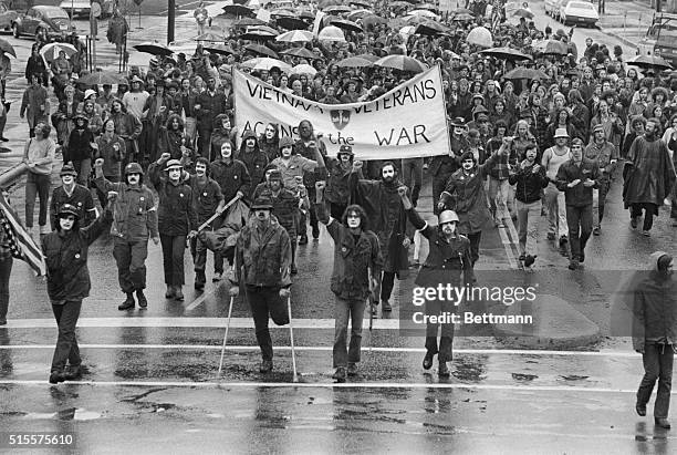 Students from North Carolina State University and the University of North Carolina march on the state capitol to protest the Vietnam War.