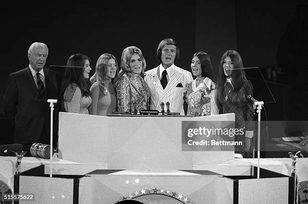 Miami Beach, FL: Singer Pat Boone and his family lead the GOP National Convention in the National Anthem at the beginning of the third session. From...