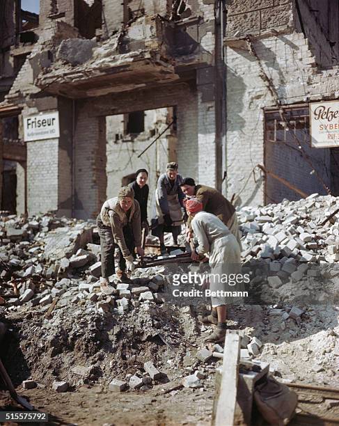 German women working in the rubble of post-war Germany. Color slide, 1948.