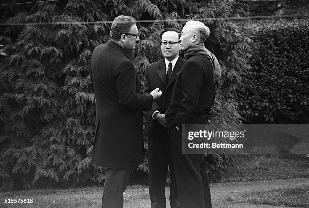 Paris: Henry Kissinger , Pres. Nixon's national security adviser, and North Vietnam's Le Duc Tho engage in animated conversation in the garden of a...