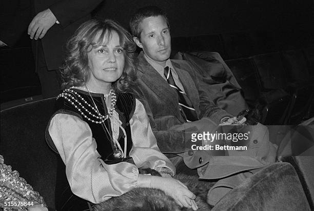 French actress Jeanne Moreau and film director William Friedkin, who plan to marry within the week, go to the movies in New York January 24. They are...