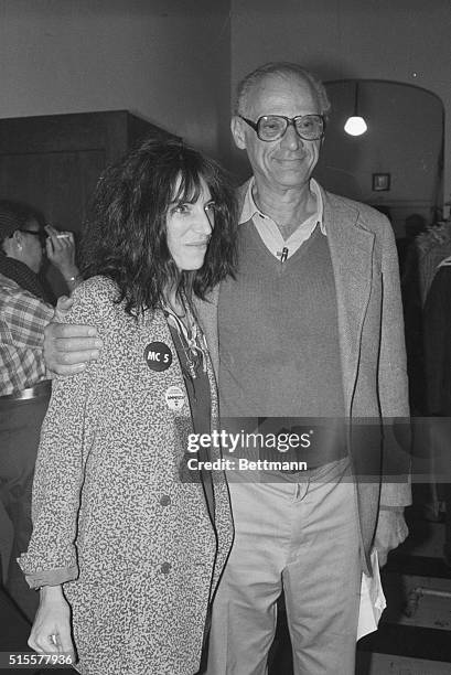 Playwright Arthur Miller and punk singer-poet Patti Smith attend a party celebrating Amnesty International winning the Nobel Peace Prize.