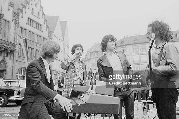 Frankfurt: "The Doors," pop group from Los Angeles, shown during a break in the open-air concert which they were taping in front of town hall. The...
