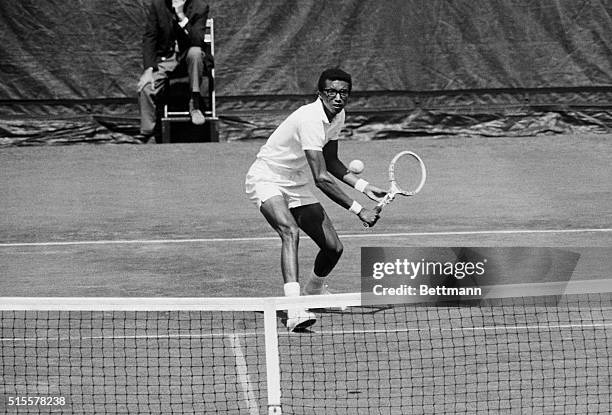 New York, NY-ORIGINAL CAPTION READS: Arthur Ashe of the U.S. An Tom Okker of The Netherlands will meet 9/9 in the finals of the U.S. Open tennis...