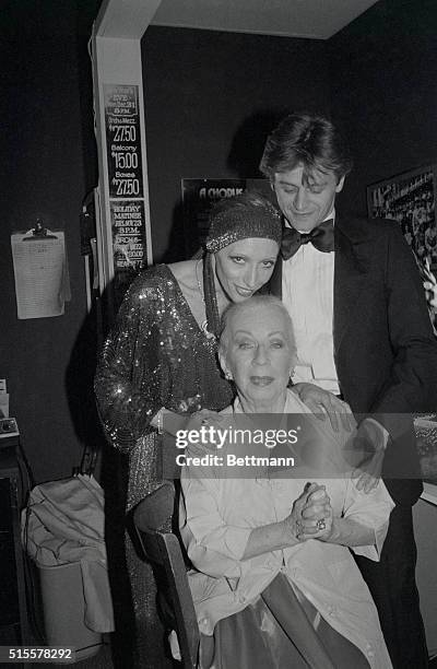 Natalia Makarova embraces choreographer Agnes de Mille as Mikhail Baryshnikov watches at a tribute to Agnes de Mille at the Shubert Theater in New...