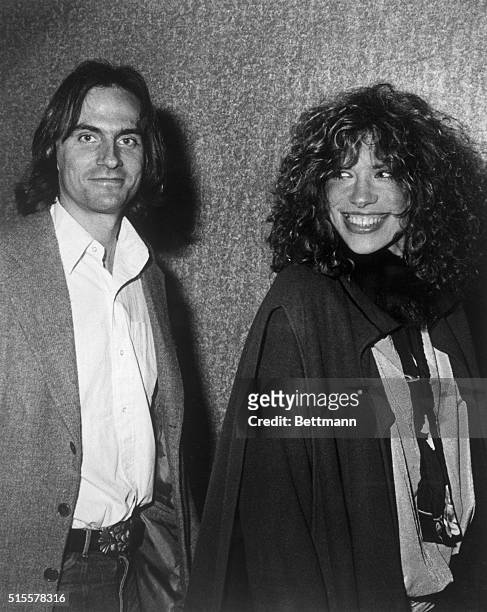 Married soft rockers James Tayor and Carly Simon attend a preview of "The Last Waltz" movie.