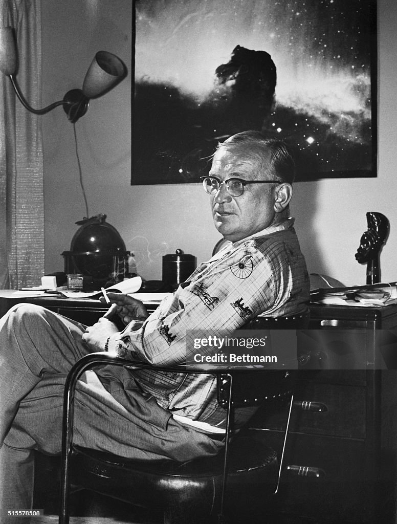 George Gamgow Relaxing in his apartment in the University Club, George Gamow takes ...