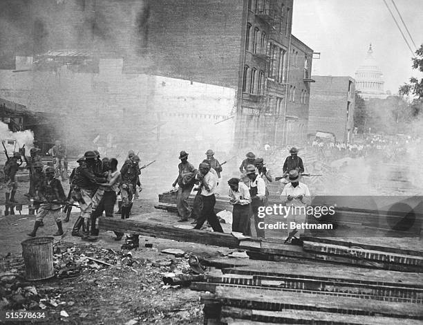 Washington, DC: Bonus Army; Veterans dispersed by soldiers with tear gas, July 28, 1932. Washington, DC. Photograph.