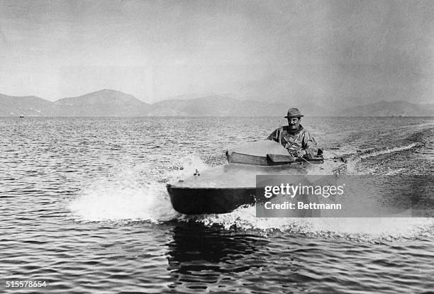 Giacomo Puccini , Italian operatic composer aboard his motor boat. Undated photograph. BPA2# 4076