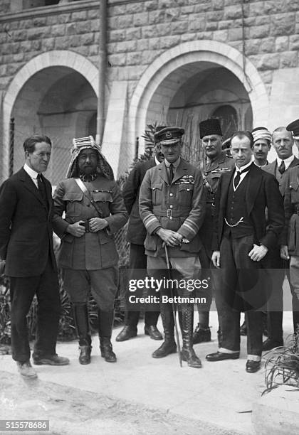 Col. T.E. Lawrence, Emir Abdullah, Air Marshal Salmond, and Sir Wyndham Deedes. Undated photograph.