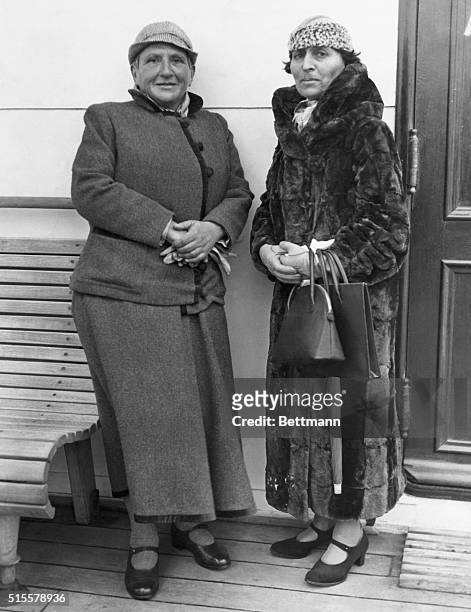 Writer Gertrude Stein and her secretary, Alice B Toklas, arrive in New York City on October 24, 1934.