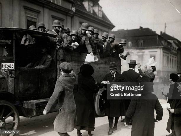 Berlin, Germany: Loyal German Government troops in Berlin shown distributing anti-Communist pamphlets. Photograph, March, 1920.