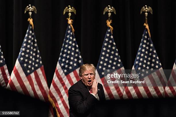 Republican presidential candidate Donald Trump yells into the crowd at the conclusion of a campaign rally at Lenoir-Rhyne University March 14, 2016...