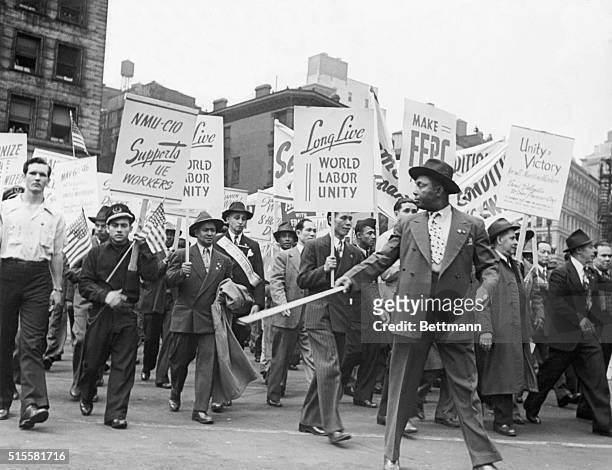 New York, NY: May Day parade in New York City in which wokers carry labor signs. Photograph, ca. 1946.