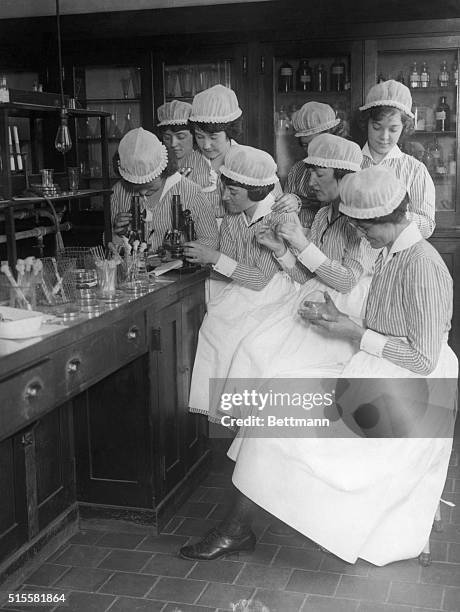 Group of nurses train in a bacteriology lab at Bellevue Hospital in Manhattan.