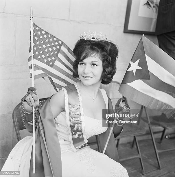 New York, NY: 45th Anniversary of the granting of U. S. Citizenship to Puerto Rico. Central Park mall. Photo shows Gladys Gomez of 685 Peck St.,...