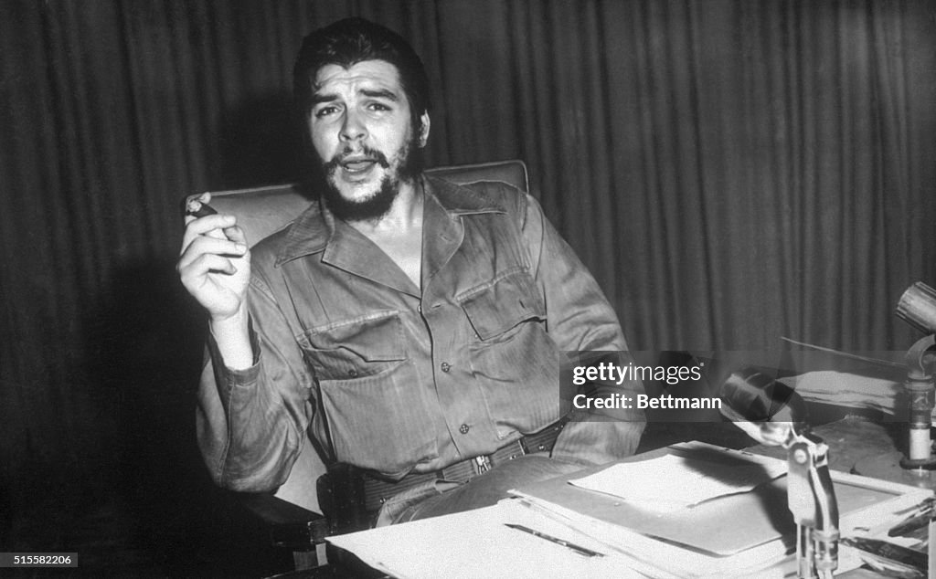 Che Guevara Sitting at a Desk
