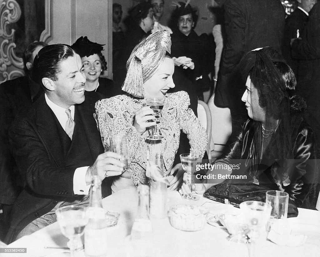 Carmen Miranda and Friends Eating Dinner