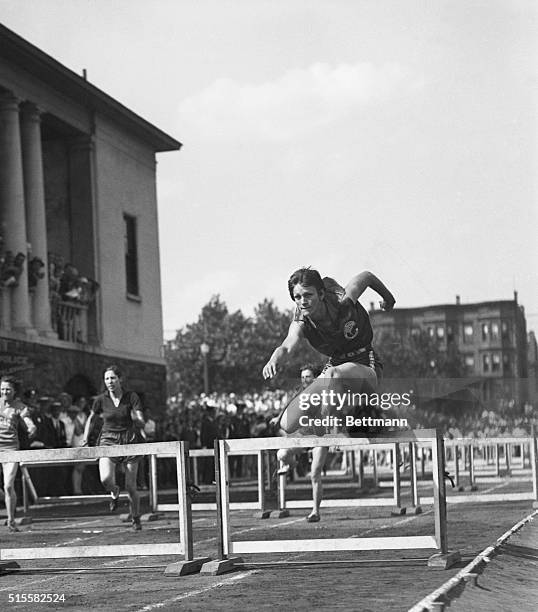 Athlete Babe Dickerson jumps a hurdle in an event she won at the 1932 Olympics in Los Angeles.