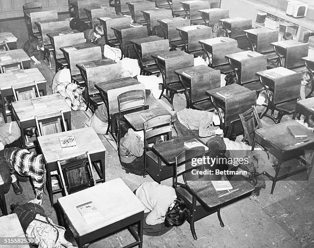 Students take cover during an air raid drill in St. Mary's Berea.