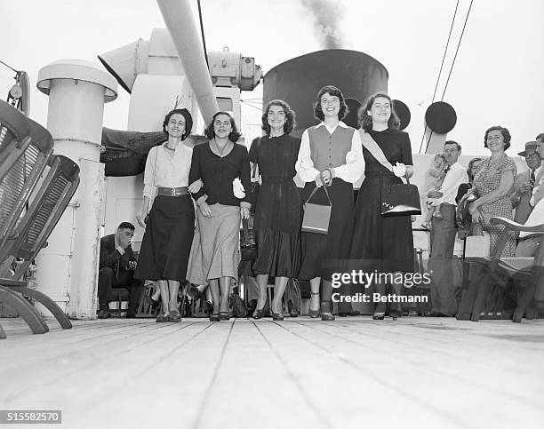 American university exchange students on the deck of an ocean liner that will take them to France where they will live for a year. L-R: Elizabeth...