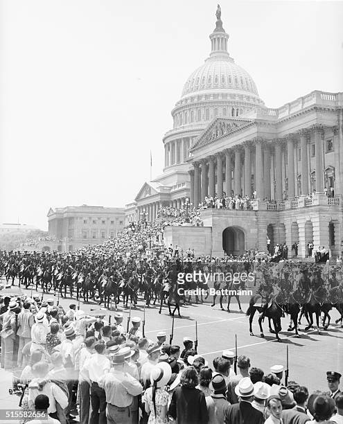 The US Cavalry lead the royal procession of King George VI of England and Queen Elizabeth