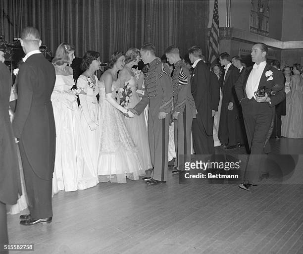 New York,NY: Debutanrte Cotillion and Christmas Ball at the Waldorf-Astoria Hotel. Photo shows cadets and young men of society being greeted by the...