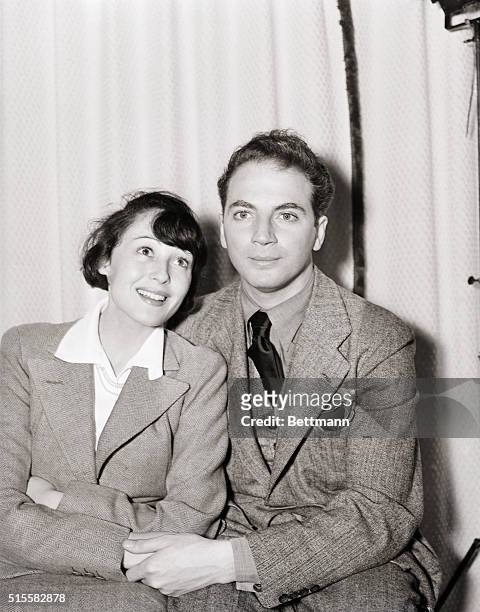 Luise Rainier, Viennese screen star, and Clifford Odets, American playwright, are shown above in Rainier's Brentwood, California home prior to their...