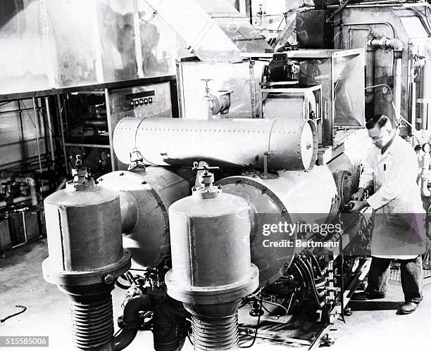 St. Louis, Missouri: Here is the 100-ton, $60,000 cyclotron at Washington University in St. Louis. The giant atom-smasher was operated day and night...