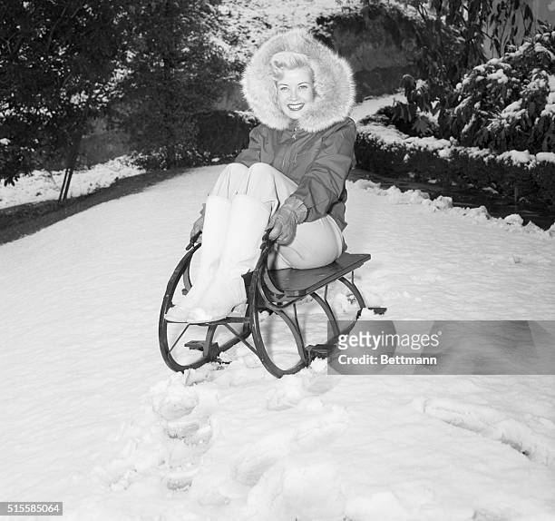 Hollywood, CA: Being snowbound was a completely new experience for members of the "Yes Sir, That's My Baby" company, but the snow didn't bother...