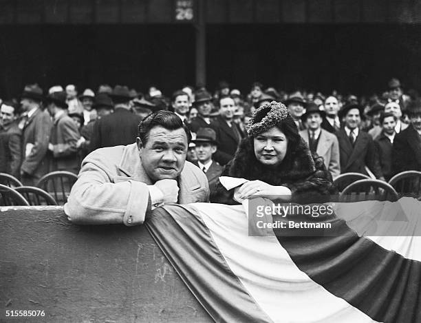 Babe Ruth sits with his second wife, Claire Hodgson, during a Yankee game against the Boston Red Sox.