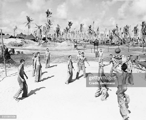 Soldiers relax with a game of volleyball on Eniwetok Atoll during World War II.
