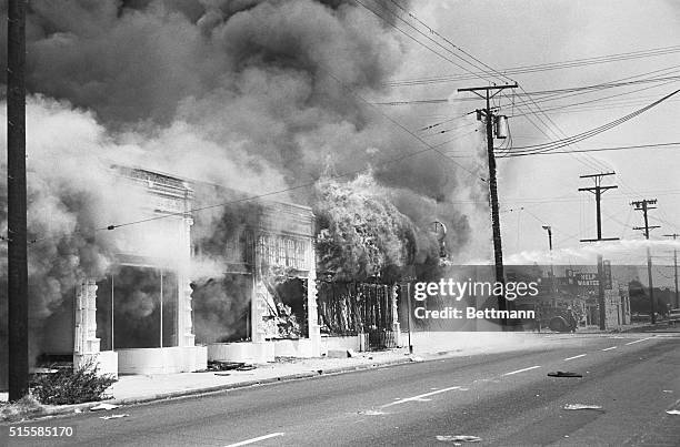 Los Angeles: "Help Wanted" is what the sign says and what firemen want in Southeast Los Angeles 8/14/ as looting, burning and rioting continues for...