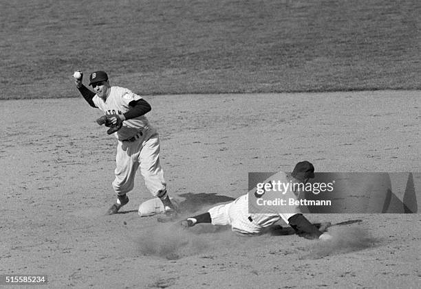 New York, NY: Yankees' Joe DiMaggio is out at second base on a fourth inning force play at Yankee Stadium. Boston Red Soxer Walt Dropo threw Yogi...