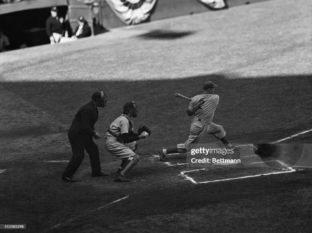 Baseball Player At Plate After Swinging