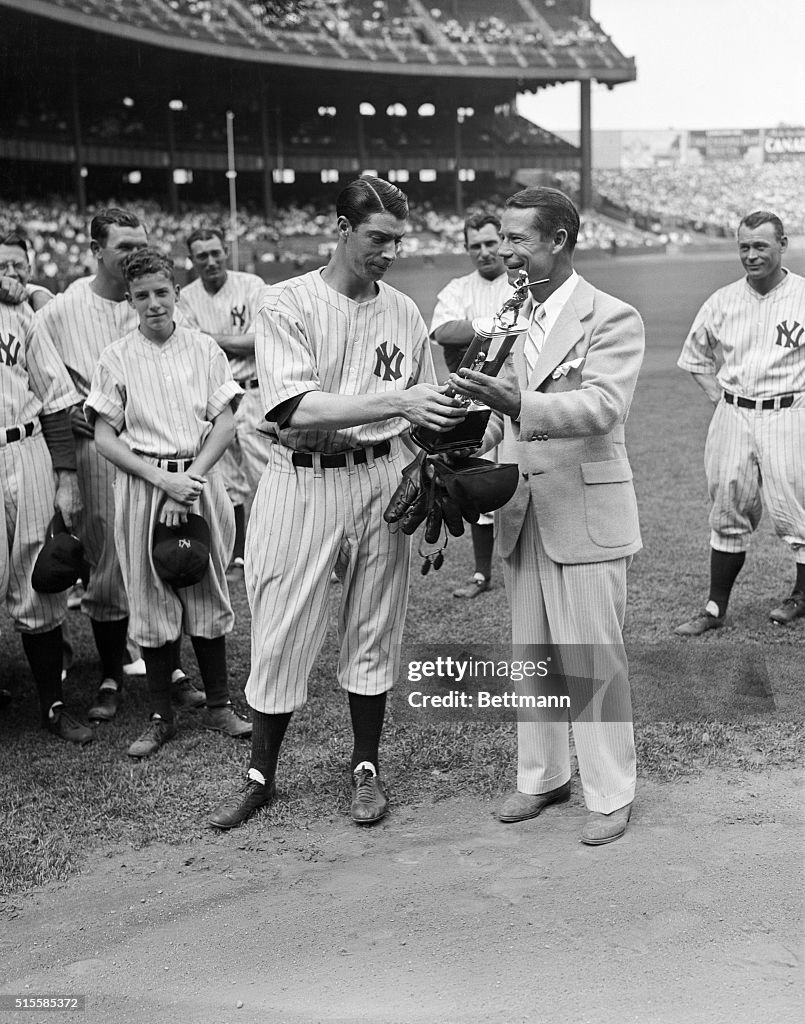 Joe Dimaggio Receiving Trophy On Field