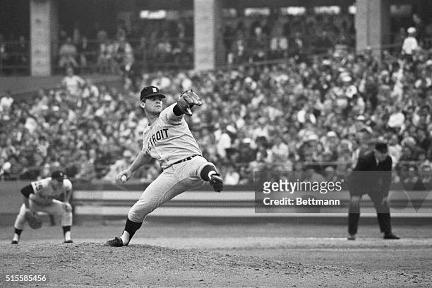 St. Louis, MO: Busch Stadium... Classical form is displayed by Tiger pitcher Denny McLain as he fires to one of the Cardinal players here 10/9 during...